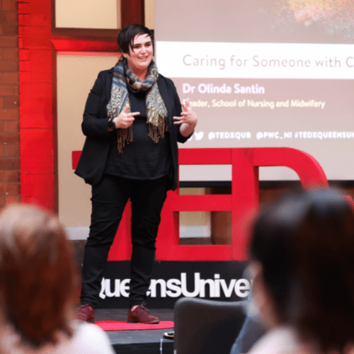 TEDx Ctrl+Alt+Del Speaker on Stage - Dr Olinda Santin