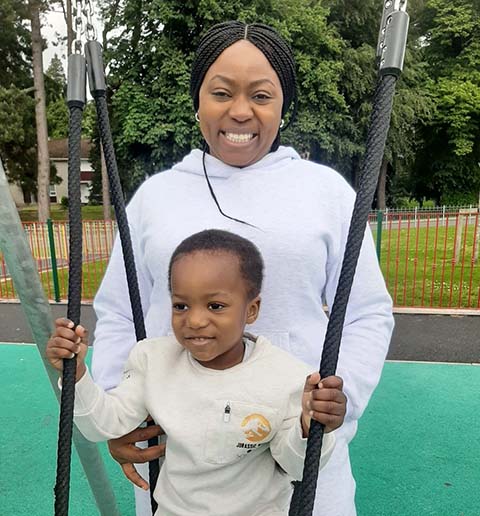 Happiness and her Son on a swing