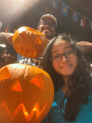 Darshana and friends with carved pumpkins