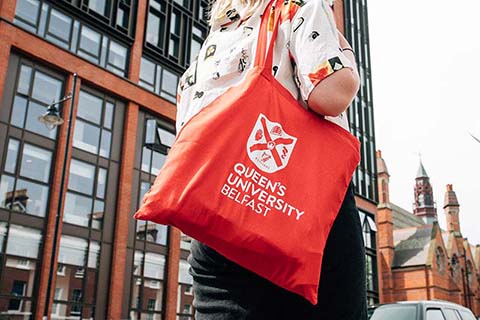 Student carrying a Queen's branded bag