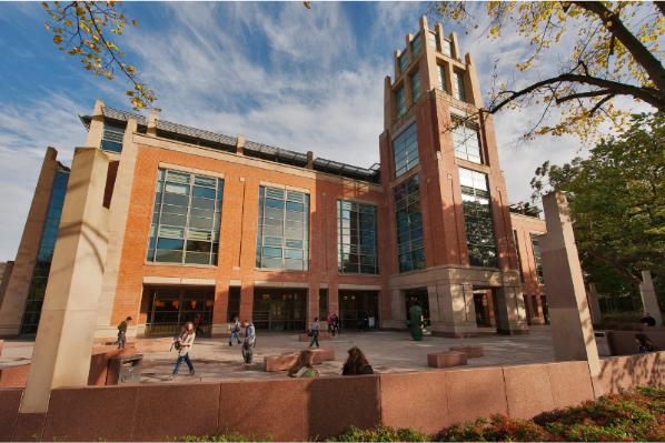 Students and alumni outside the McClay Library