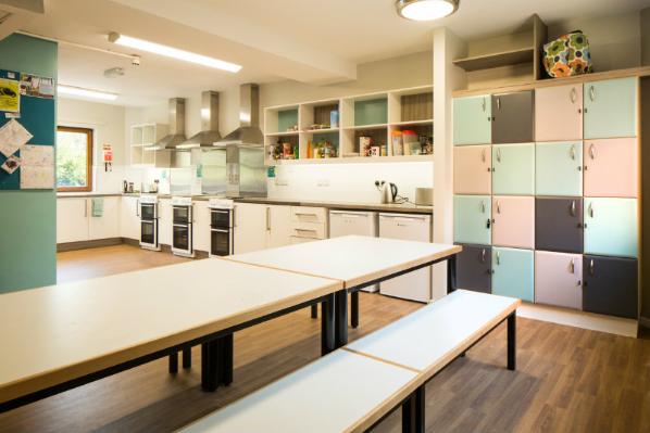 Large kitchens and common rooms are shared by 16 students.