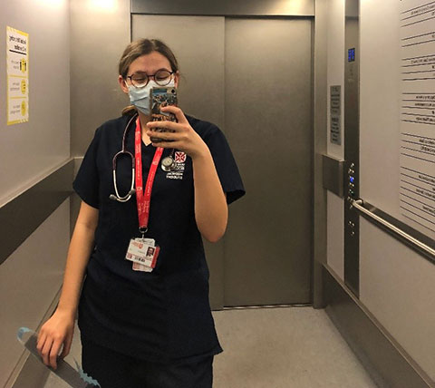 Kathryn taking an elevator selfie