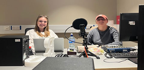 Two members of Queen's Radio in the Studio