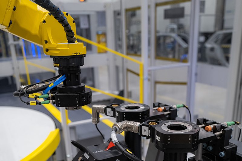 Robotic machine in yellow, black and grey