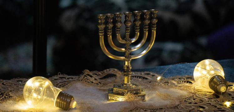 bulbs and a menorah on a table