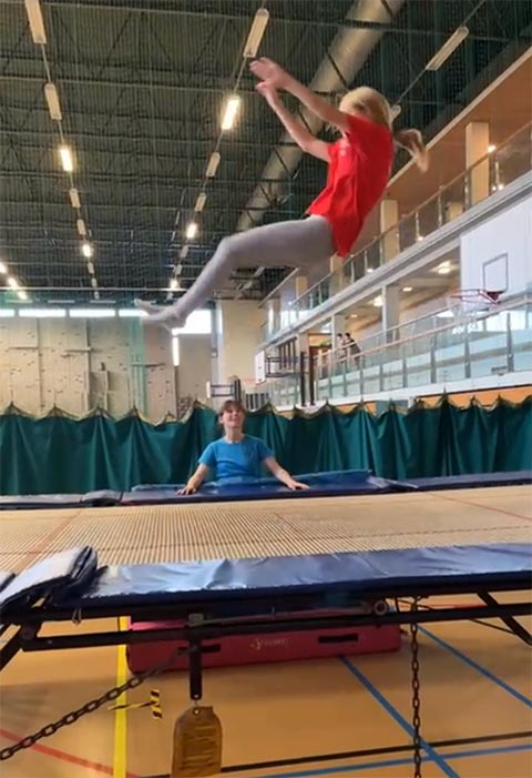 student trampolining