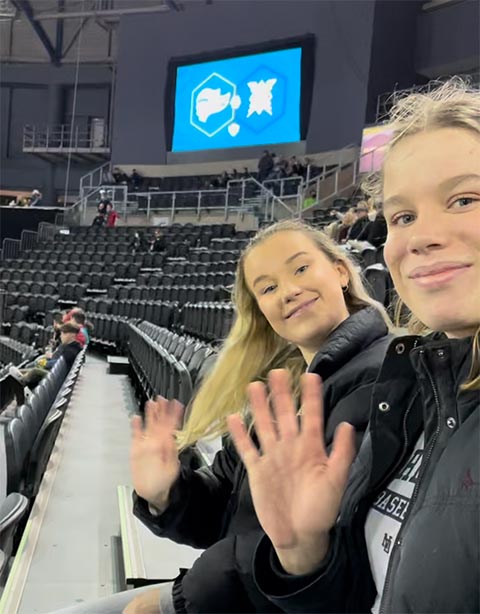 Charlotte Jennings and friend at a stadium