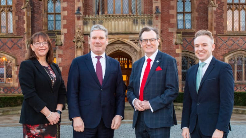 Sir Keir Starmer with the VC and senior Queen's colleagues in front of the Lanyon Building.