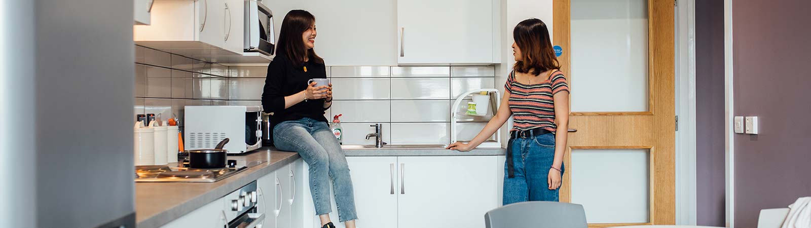 Two students in the kitchen