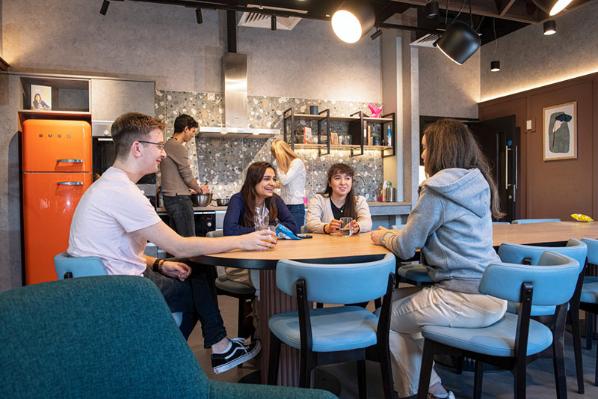 Students in the shared kitchen