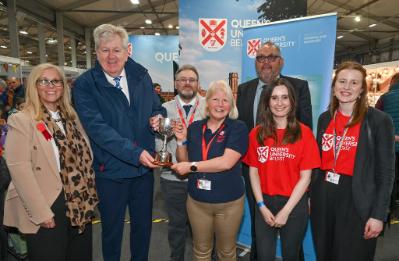 The Royal Agriculture Society present staff from Queen's University with an award for Best Trade Stand