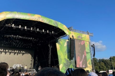 stage and blue sky at an outdoor festival