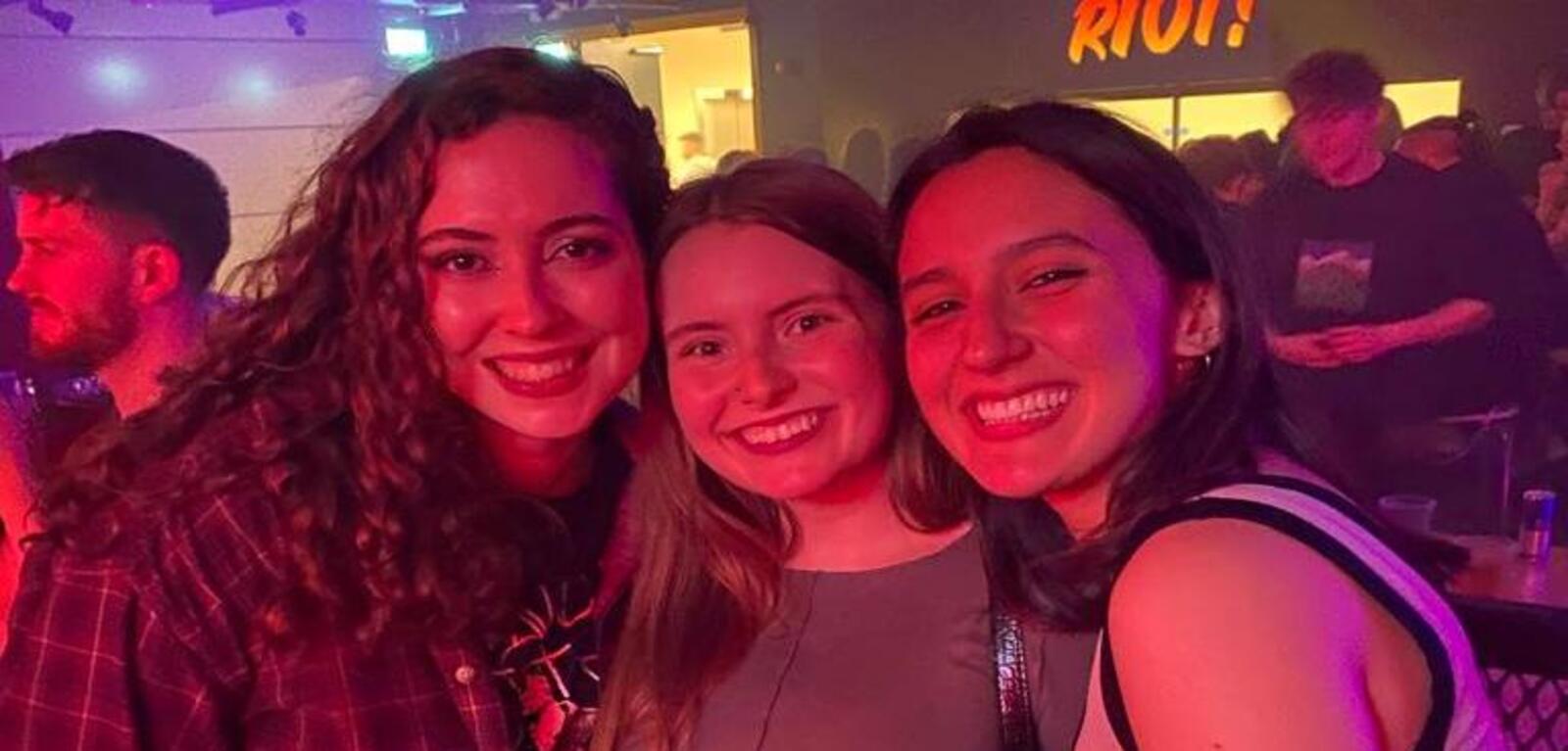 Group of 3 students at the Queen's Union Bar