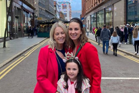 Student's family posing together in Belfast