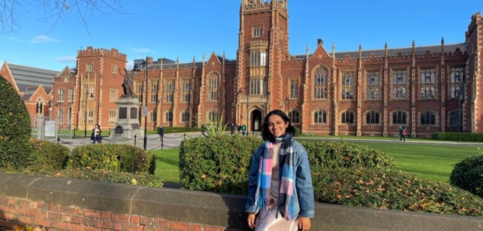 Radhika Gupta in front of the Lanyon