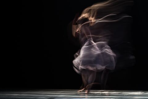 Ballerina mid-movement