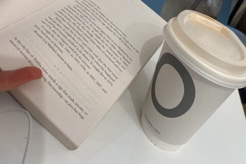 Book and cup of coffee