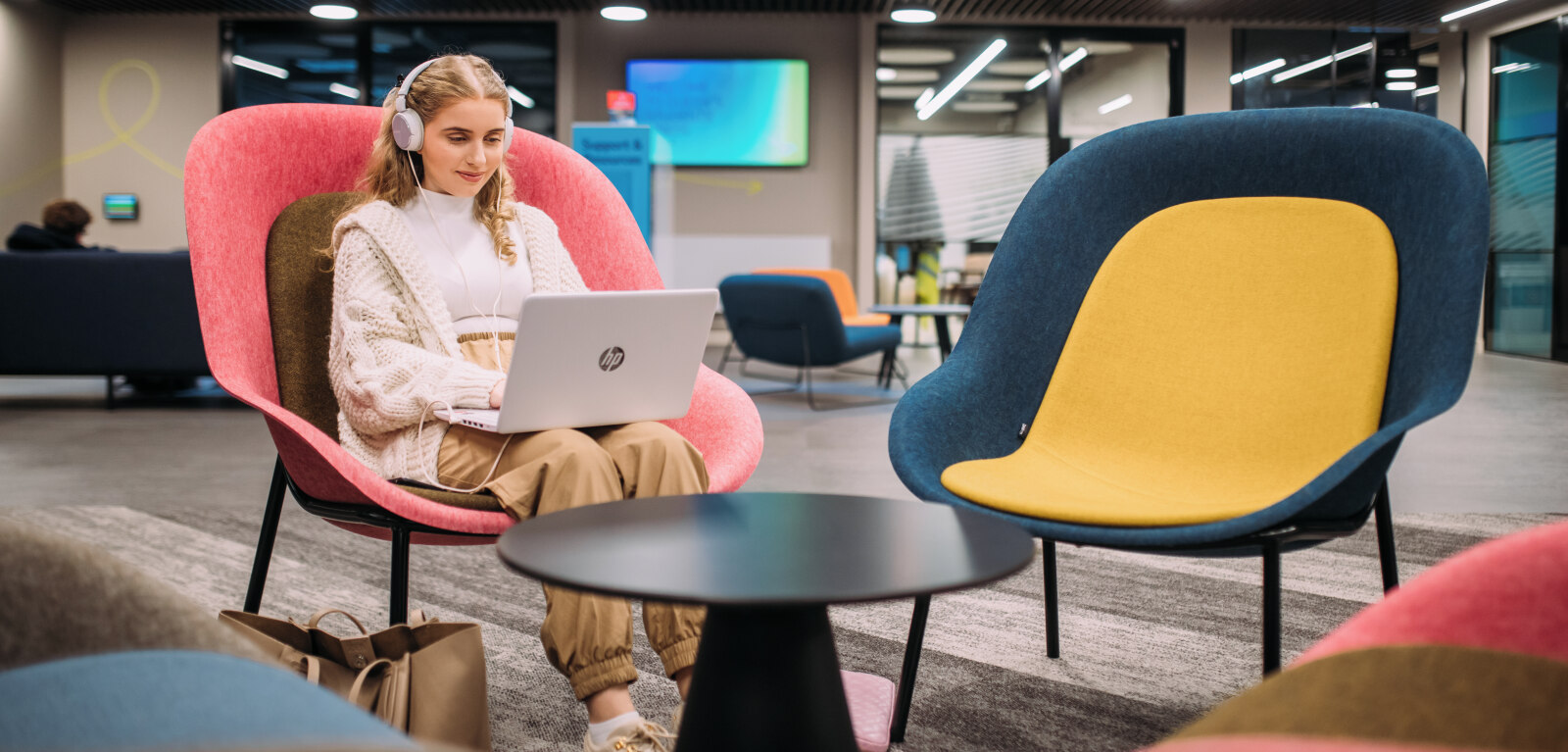 Student on laptop in One Elmwood building