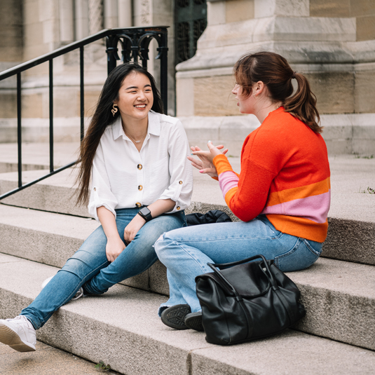 Two students talking together