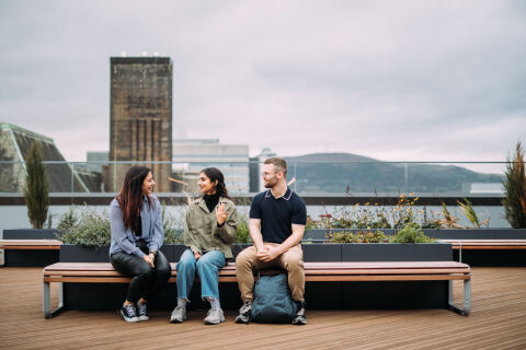 Students on roof of One Elmwood building