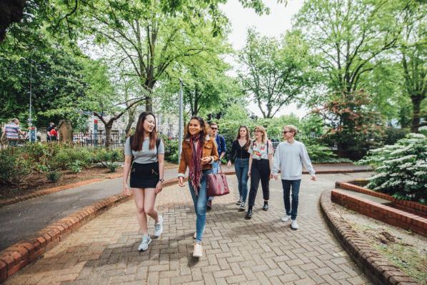 Students walking past the School of Music