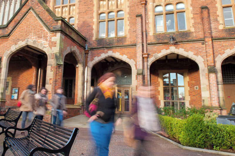 Students passing through The Quad on a winter morning