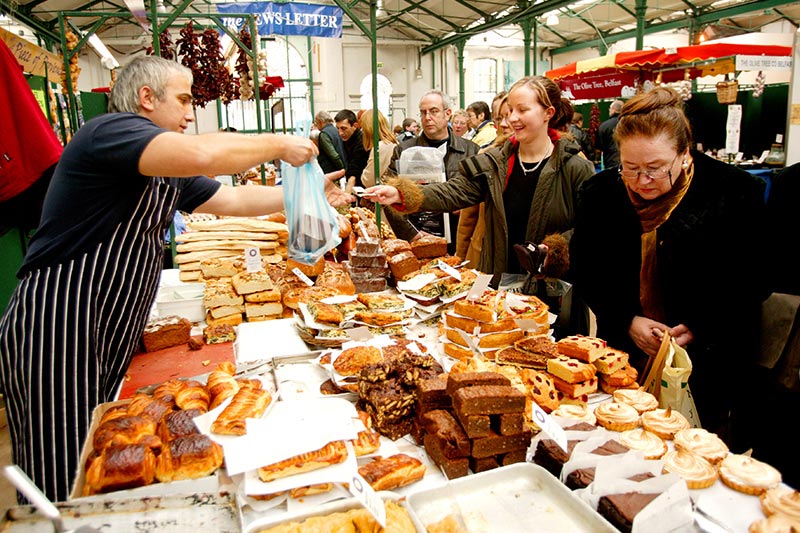 Customers shopping at Saint Georges Market
