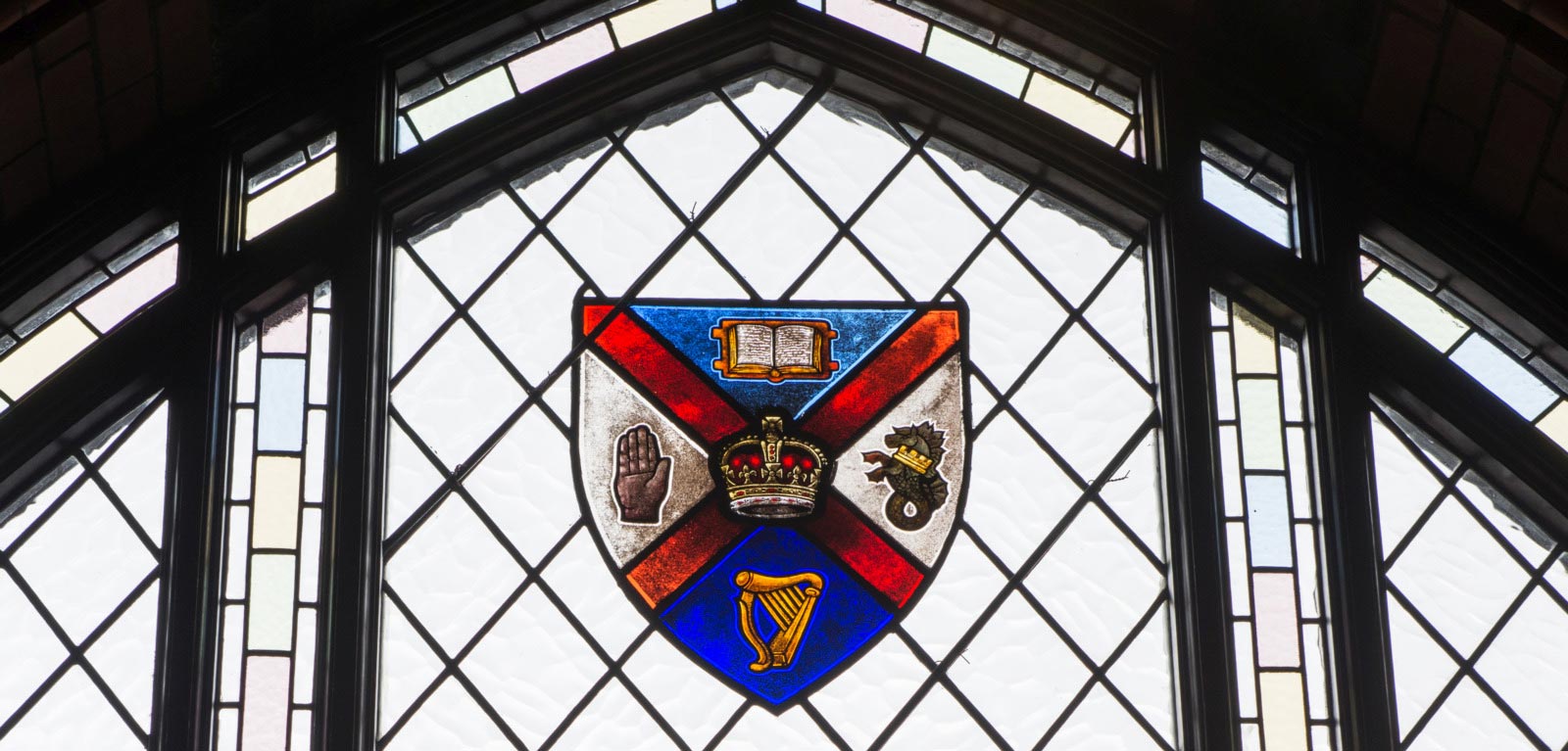 Graduate School window with crest