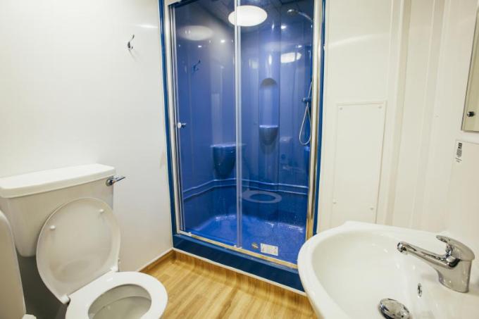 newly furnished bathroom in Mount Charles accommodation with blue shower