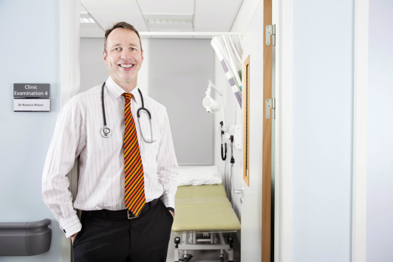 Research student smiles in the simulation centre