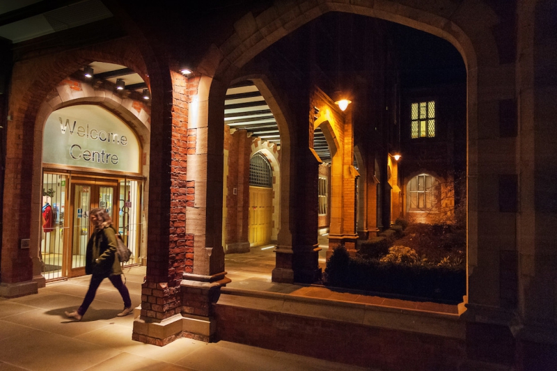 Queen's welcome centre via the quad, between cloisters