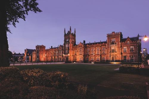 Lanyon building and front lawns at night time
