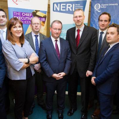 Vice Chancellor, Professor Patrick Johnston, with panelists and speakers at the event