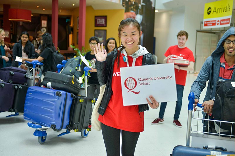 A group of students from India are greeted at the airport by our student volunteers
