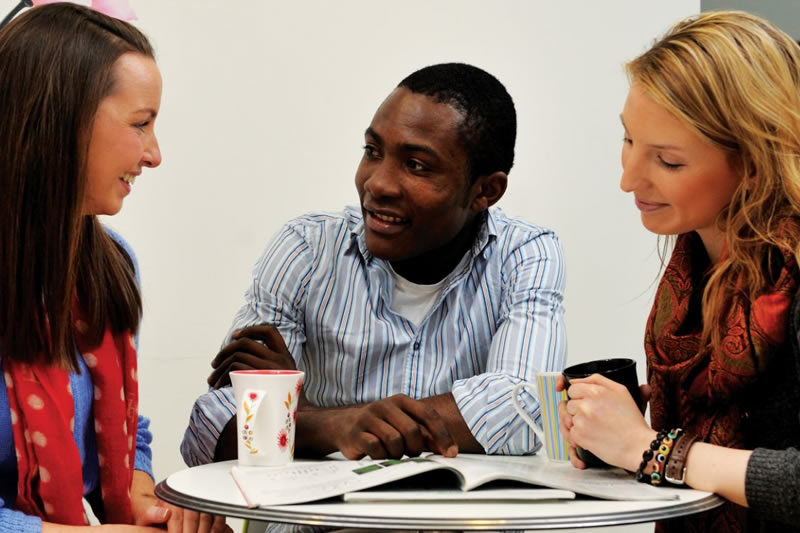 Students sitting around a table