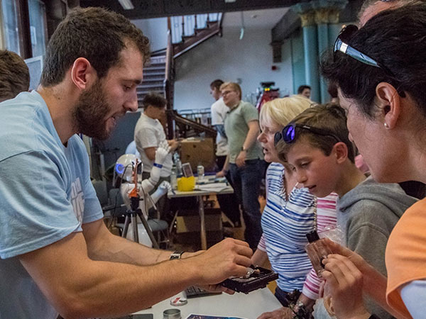 Jack speaking with a child at a CDT promotional event