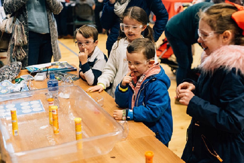 Children enjoying the road show at the NI Science Festival