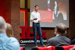 'Can cash cure conflict?' with PhD Politics student Patrick Brown at TEDxQueensUniversityBelfast on Thursday 23 May 2019