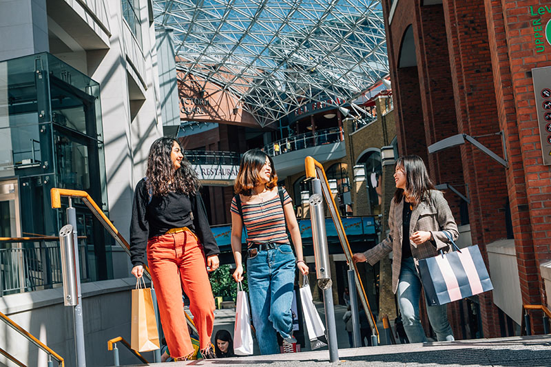 3 female students shopping in Victoria Square