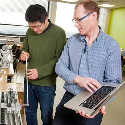 Professors working in a lab