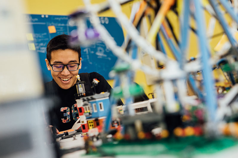 A student experiments in Lego room, part of the Computer Science Building