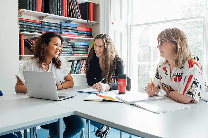 Female students doing group work