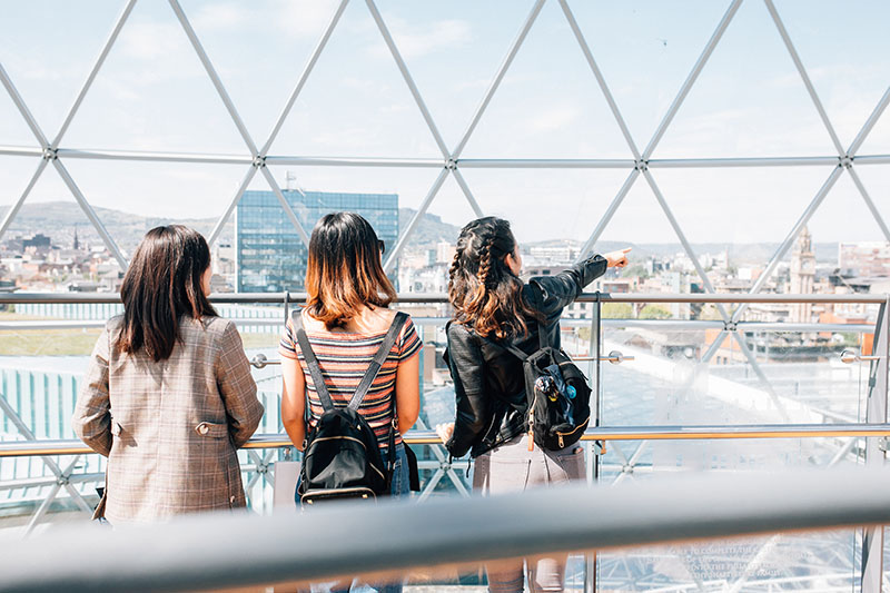 Three students admiring the view from Victoria Square  Shopping Centre