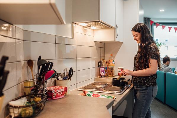 Put your cooking skills to the test in the shared kitchen.