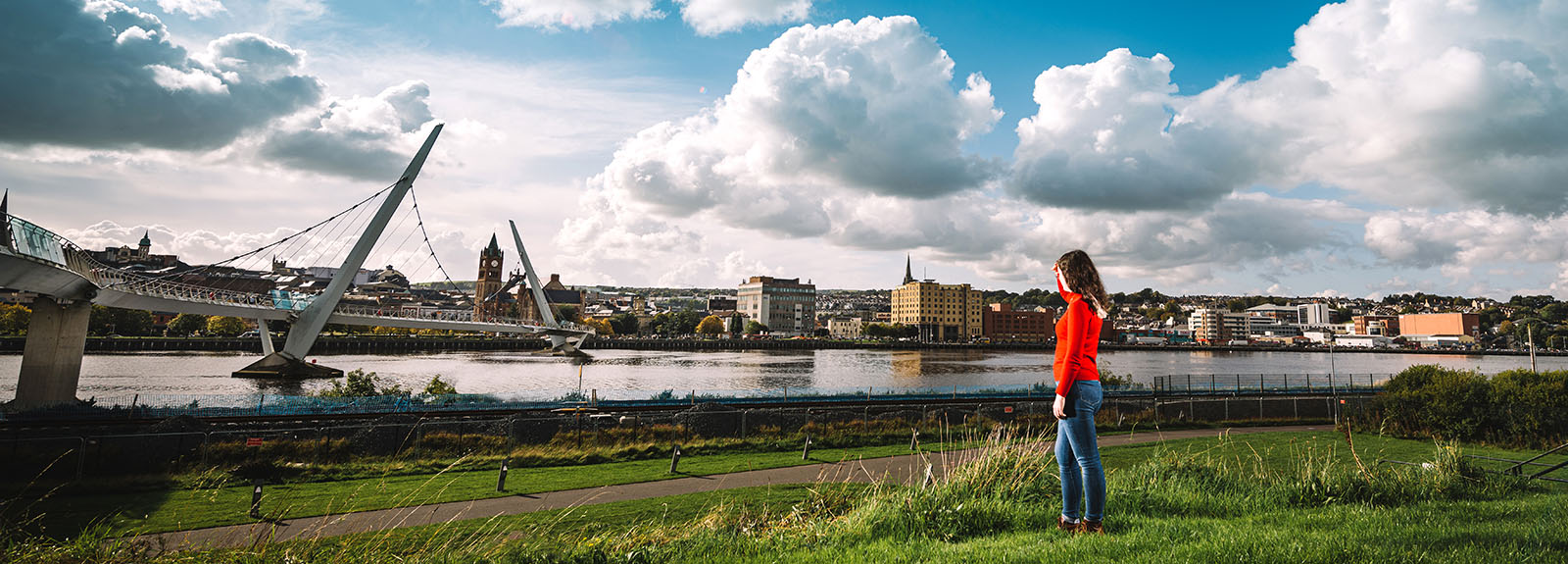 Girl looks at the bridge in Derry ~ Londonderry