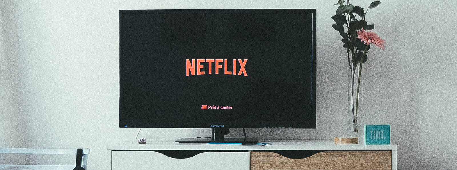 Image of a TV screen showing the Netflix logo