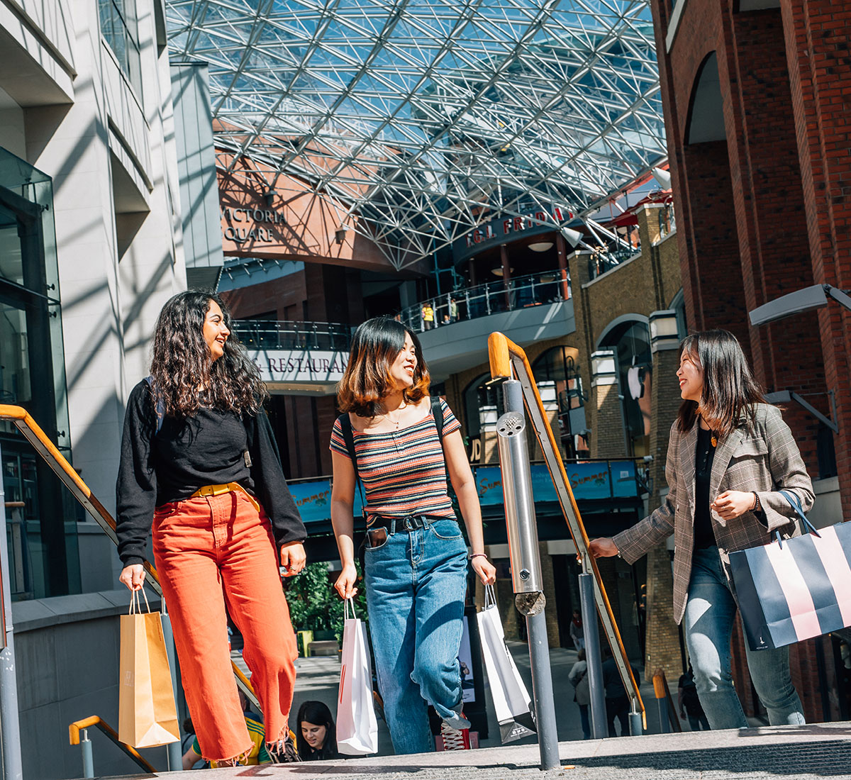 Three students shopping at Victoria Square