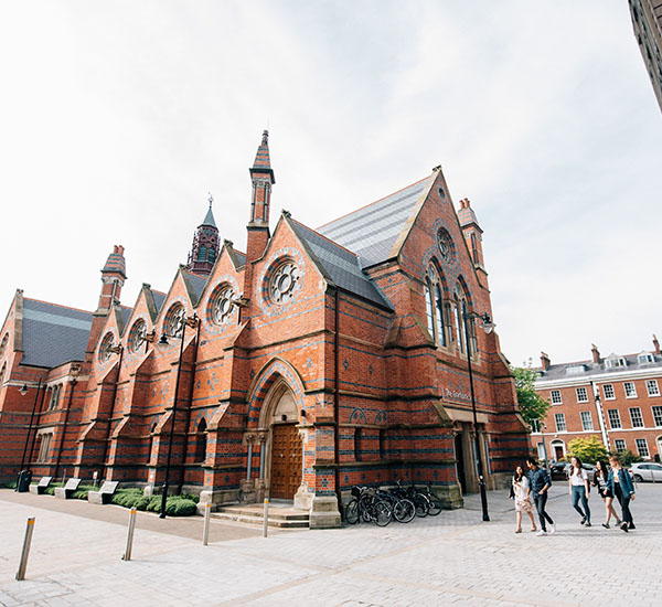 Students walking past The Graduate School