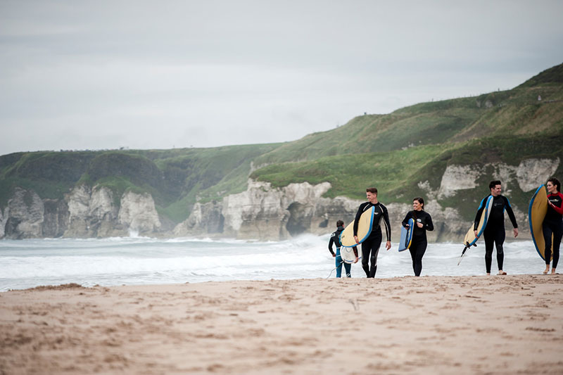 Surfing at Whiterocks Beach